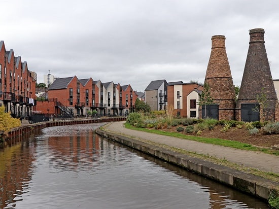 Canalside housing and bottle kilns in Stoke on Trent