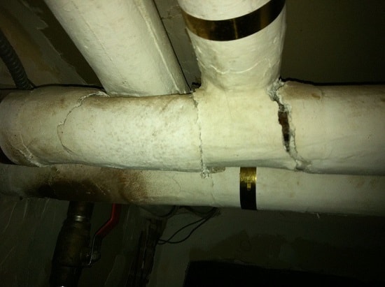 A pipe containing asbestos, this is an example of an ACM